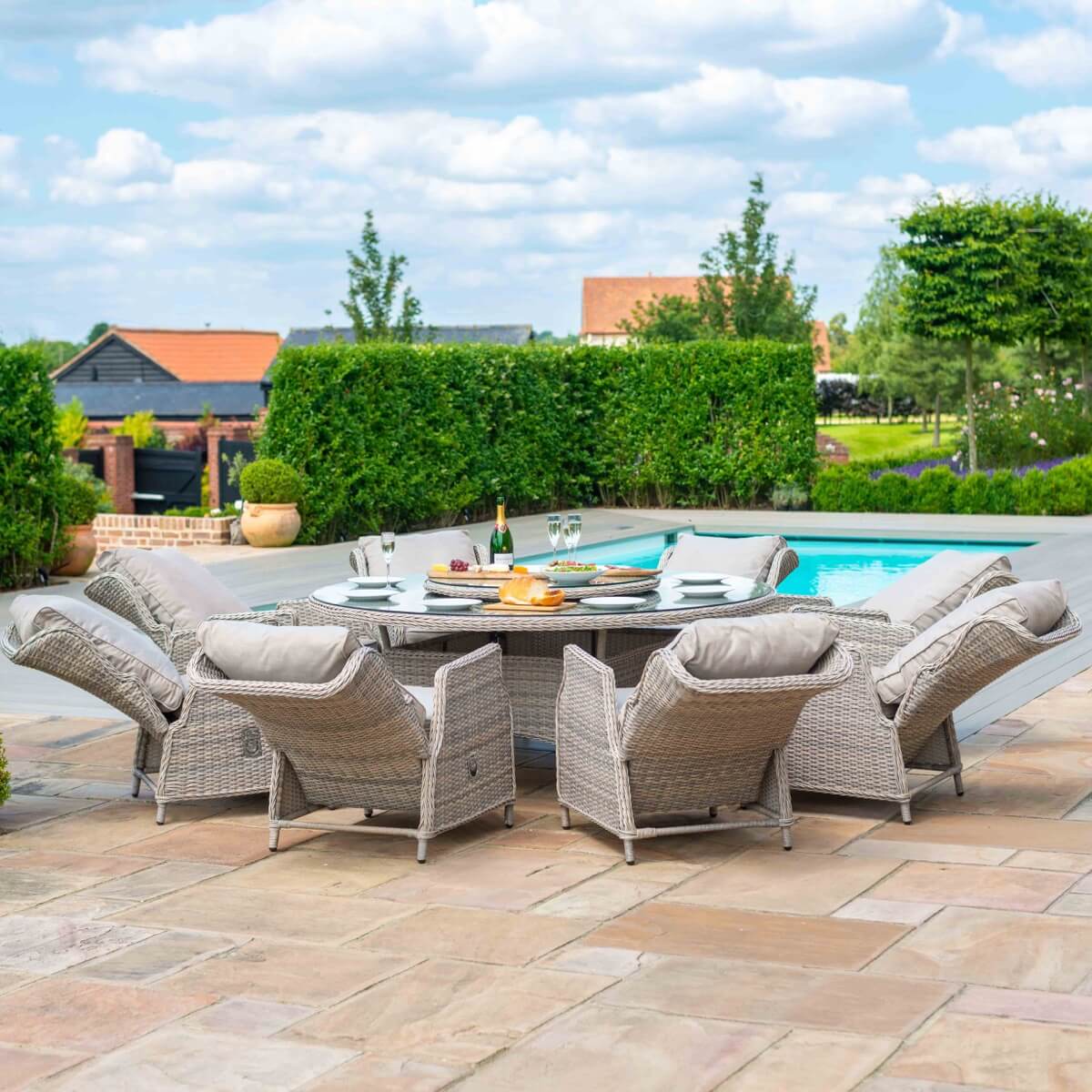 Cotswold Reclining 8 Seat Round Dining Set (With Woven Lazy Susan)